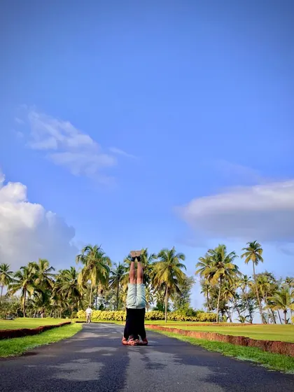Yoga is a science of well-being. These images capture the beauty of practicing in nature, from the beach at sunrise to a lush green park, reminding us to connect with the world around us.