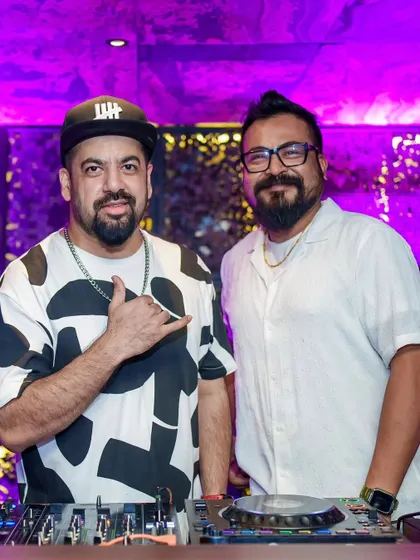 Posing with a fellow DJ at Kaze. It's always great to connect with other artists.