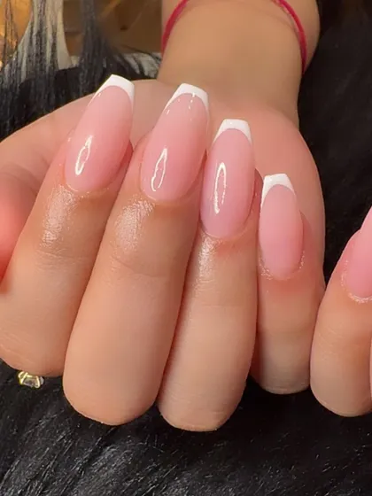 Another close-up of the clean and crisp lines of a classic French manicure.