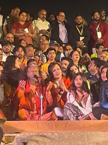 Witnessing the divine Ganga Aarti at the Holy Sangam during our Kumbh Mela yatra.