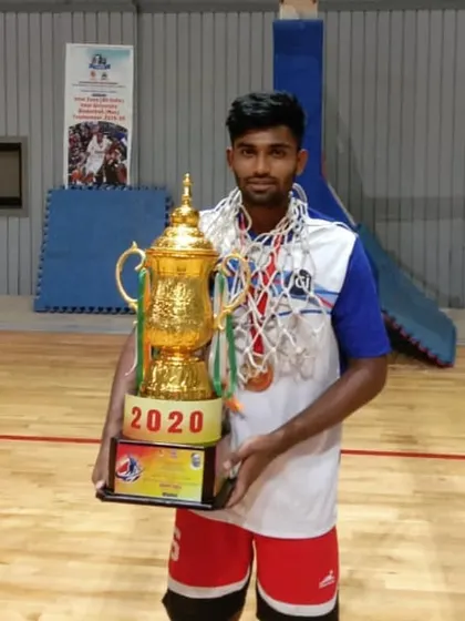 Holding the All India Inter-University championship trophy. A moment of immense pride and the result of countless hours of practice.