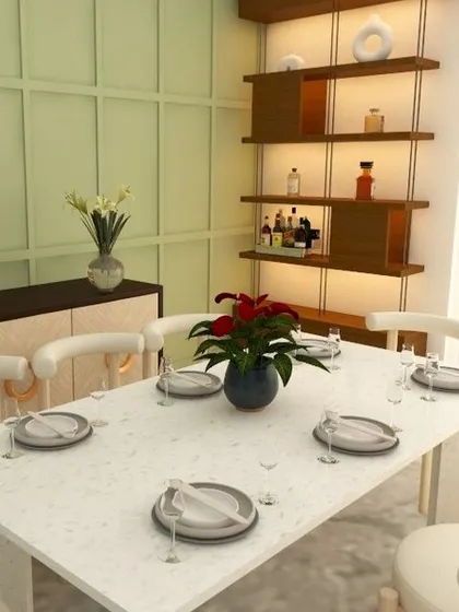 A full view of the dining area, showcasing the light green paneled wall, modern white furniture, and the stylish bar unit in the corner.