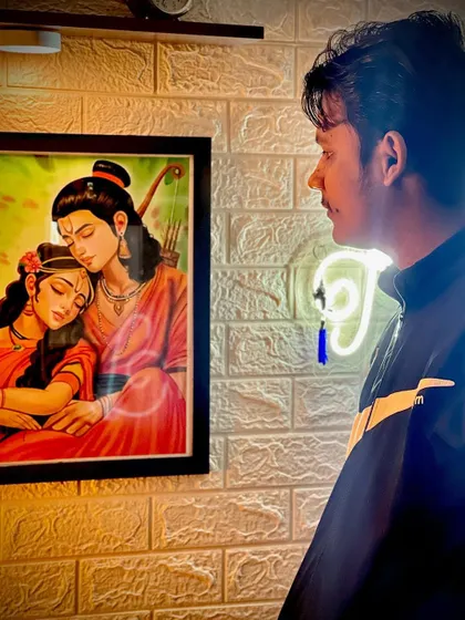 Me with my finished and framed Siya Ram artwork. Seeing the art on the wall brings the whole creative journey to a fulfilling close.