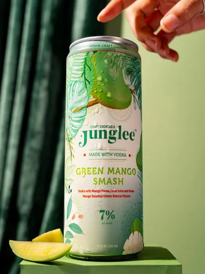 A close-up product shot of a canned cocktail, highlighting the can's design and branding.