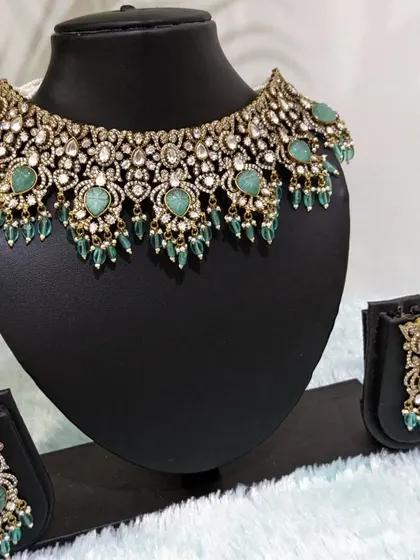 The baby-blue choker set displayed, showing its unique color and design.
