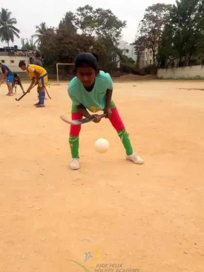 A player from our 2022 camp practices juggling the ball, a fun way to improve hand-eye coordination.