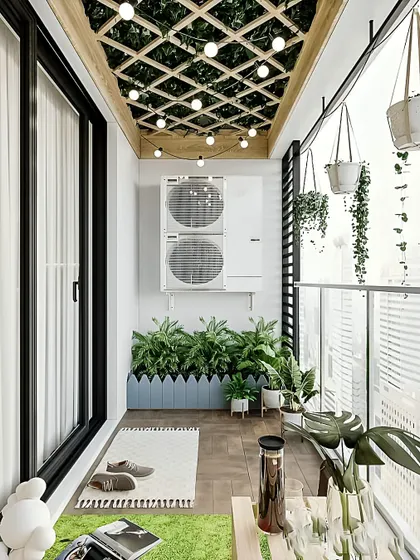 We cleverly concealed an outdoor AC unit with custom planters while adding a beautiful ceiling trellis with string lights. This design maximizes green space with hanging plants and a tidy planter box, creating a functional and beautiful urban garden.