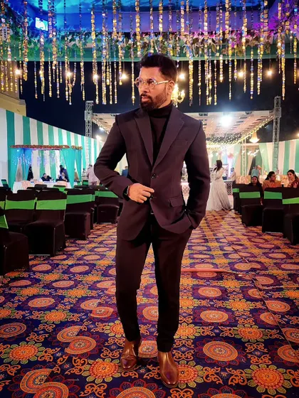 A formal look for a wedding reception. I'm comfortable in a full suit and tie, ensuring I present a professional image for high-end corporate and wedding events.