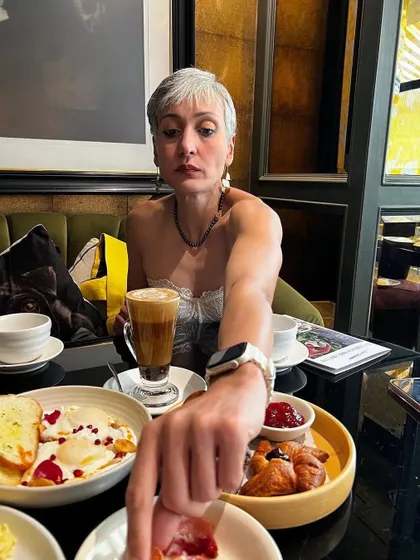 A queen enjoying her breakfast spread. This is how you start the day with style and sass.