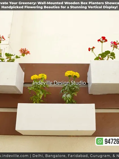 A close-up of the wall-mounted wooden box planters, showcasing the simple yet elegant design with colorful flowering plants.