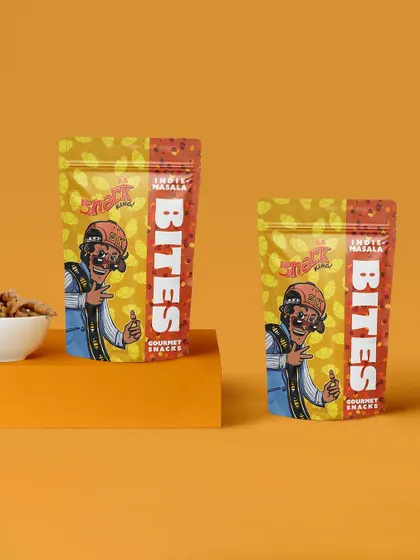 A clean, minimalist shot of 'Snack King' snack packages. The color-blocked background and simple props keep the focus entirely on the product's branding.