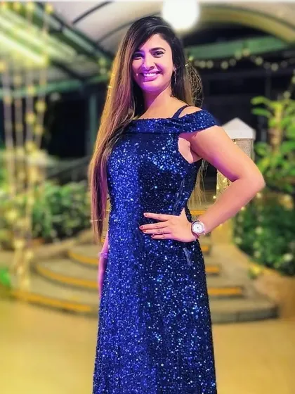 A happy client looking stunning in the blue sequin gown. My goal is to make every client feel this amazing.