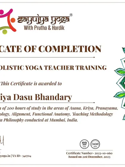 A certificate for a graduate of our 200-hour Holistic YTTC, recognizing their deep study.