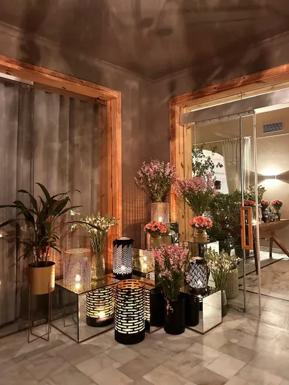 The entrance to our hall, where reflections and soft lighting create an inviting and layered look.