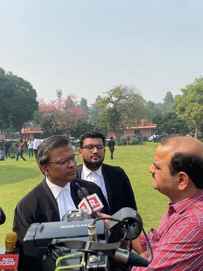 Briefing a group of journalists after a court session, ensuring the legal facts of the case are communicated accurately.