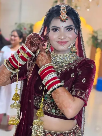 Your mehndi is a key part of your bridal look. Here, you can see how the deep, rich color of my organic henna beautifully complements the bride's stunning wedding lehenga and jewelry.