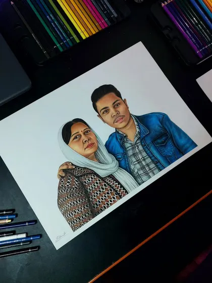 A hyper-realistic colour pencil sketch of a mother and son for a client in Rajasthan. This A3 piece took about 24 hours, focusing on the fabric patterns and expressions.