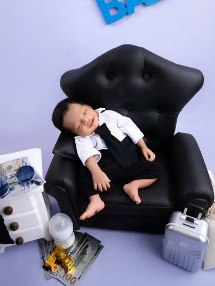 A funny, expressive moment from the boss baby session. These photos are sure to bring a smile to everyone's face for years to come.