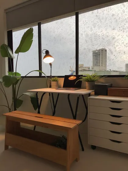 My workspace with some fun doodles on the window. I like to keep my creative environment feeling light and inspiring.