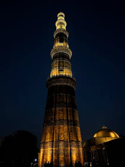The magnificent Qutub Minar in Delhi, illuminated against the night sky. I specialize in capturing heritage monuments in different lighting conditions to showcase their timeless architectural brilliance and intricate details.