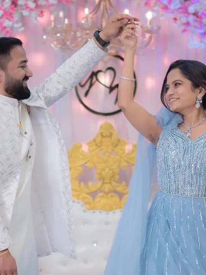 The first dance as an engaged couple. Her makeup is glamorous yet light, perfect for a night of celebration.