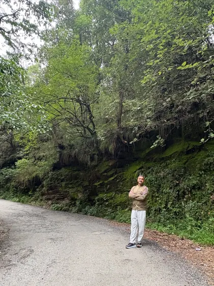 Standing on a quiet road surrounded by the forest. The eldest trees are our teachers, reminding us of what it means to be connected to all life on Earth.