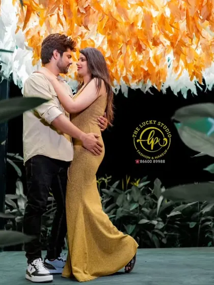 A modern and intimate pre-wedding look. I styled the couple in casual yet chic outfits, with her in a fitted gold dress and him in a simple shirt and dark jeans.