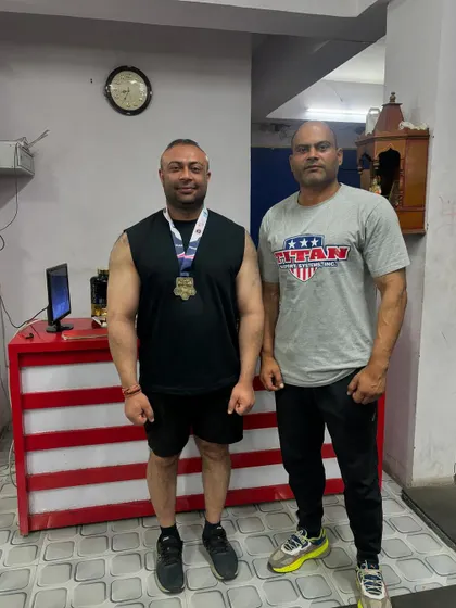 With my coach after winning gold at the Delhi State Championship and qualifying for Nationals.