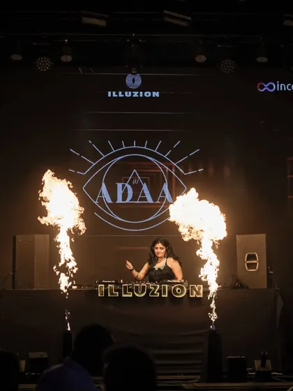 This is me in my element, commanding the stage at Illuzion. I bring the full experience to every gig, complete with pyrotechnics and high-energy visuals that make for an unforgettable night.