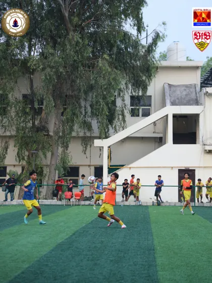 An action shot from a practice match during the VfB Stuttgart camp. These sessions are designed to simulate high pressure game scenarios, preparing our players for real competition.