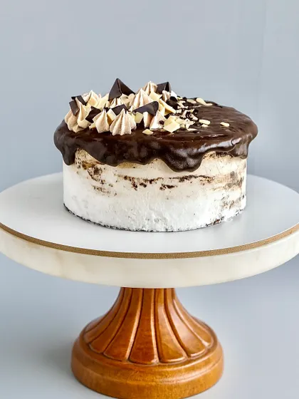 For a grown-up treat, my Bailey's Irish Cream cake is the perfect choice. I take a rich chocolate sponge, wrap it in silky ganache and whipped cream, and infuse every bite with the smooth, velvety charm of Bailey's.