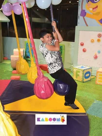 A moment of pure joy on our colorful swings. We make sure our play equipment is fun for a wide range of ages, from toddlers to bigger kids.