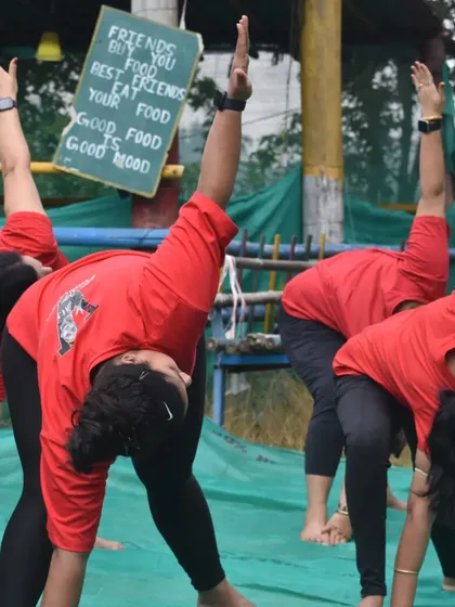 Deepening our stretches with a side bend during the yoga retreat.