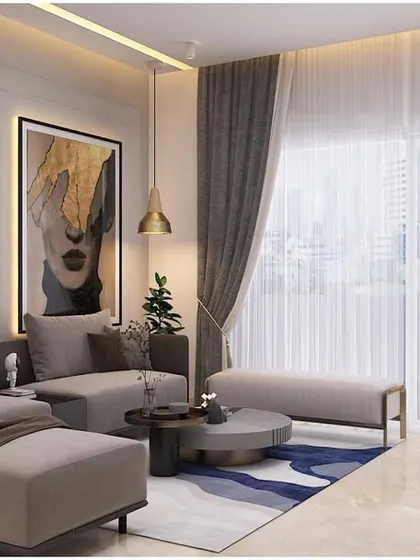 This living room design uses a muted color palette and clean lines to create a mature and classy atmosphere. The L-shaped sofa provides ample seating, while the large windows and sheer curtains fill the space with natural light.