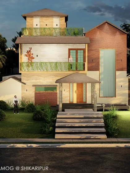 A front elevation view of the proposed residence in Shikaripura. This angle shows the combination of different building masses, roof styles, and materials to create a home that feels both expansive and connected to nature.