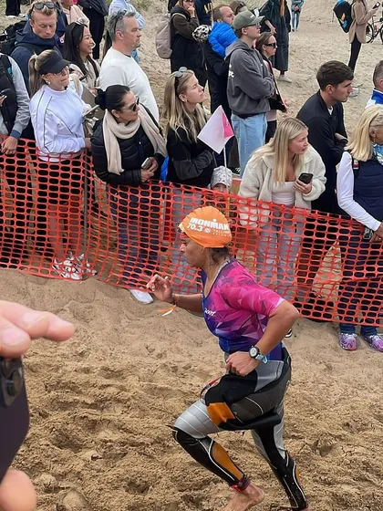 Running to T1 after the swim. I even used the "Huub breaking back tech" to get my wetsuit off quickly, a trick I learned from another swimmer. The community is all about sharing knowledge.