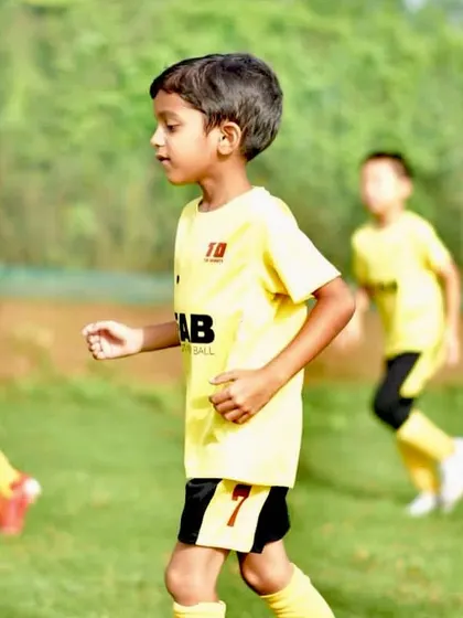 A young player focused during a game. We nurture well-rounded athletes by focusing on individualized development.