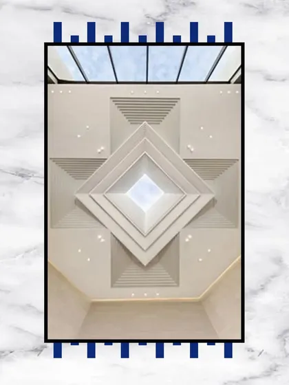 Elevating luxury to new heights. This stunning false ceiling features a geometric, layered design with a central skylight, creating an ambiance of pure, modern luxury.