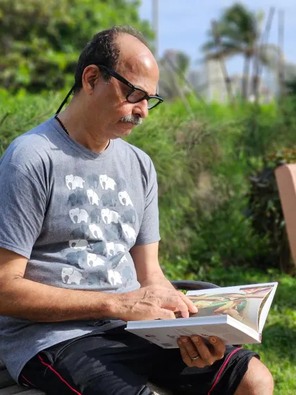 My father reading 'Memories on a Plate' in a park. It's beautiful to see how books travel across generations and find homes in different nooks and corners.