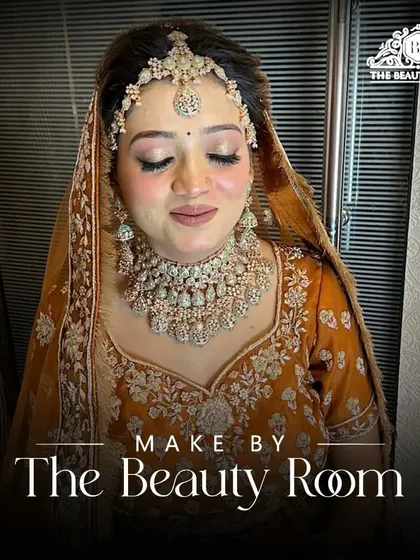 A final portrait of the bride, showcasing the complete look. The soft makeup and elegant hairstyle perfectly complement her modern bridal outfit.