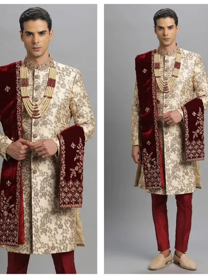 A beige printed sherwani with a contrasting maroon velvet stole. This pre-loved look is all about regal elegance and sophisticated layering.