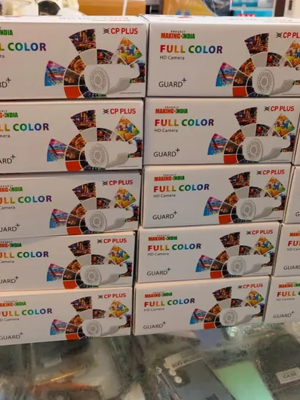 Boxes of CP Plus Guard+ full-color HD cameras. These are a popular choice for clients who want clear, colored video footage 24/7.