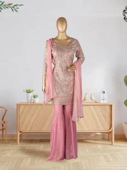 Another look at this beautiful hand-stitched sharara set. It's currently part of my clearance sale, offering a chance to own a unique Indo-Western piece for the wedding season.