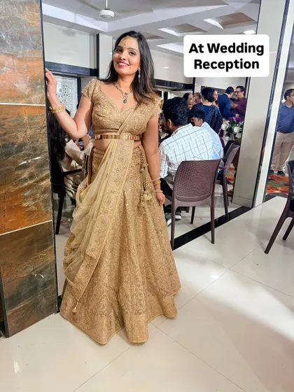 My wedding reception look, draping a dupatta on my lehenga for a sophisticated and elegant style.
