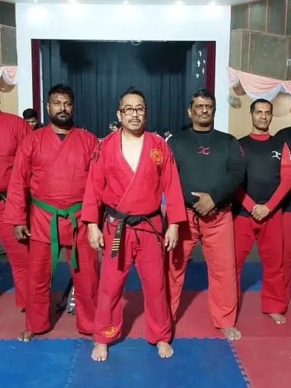 My team in our red uniforms on the final day of the UWMAF World Cup after demonstrating ShinKali, IBFF, and Krav Maga.