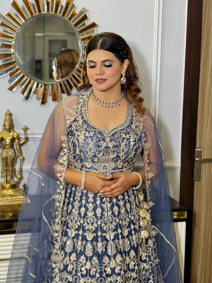 The client looking serene and elegant. The makeup is carefully applied to ensure it lasts all night long.