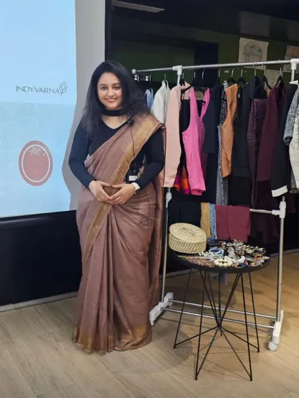 A full view of the workshop space. Having a clothing rack on hand allows me to give live demonstrations on fabric, fit, and creating different professional looks.