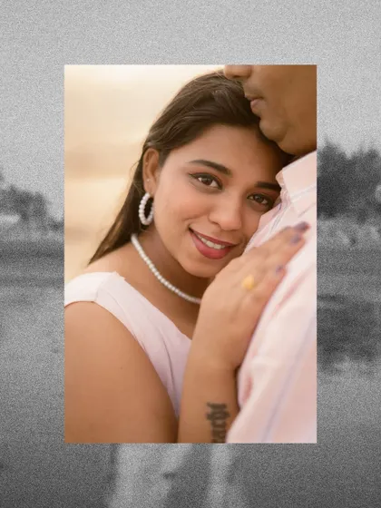 An intimate close-up of the bride-to-be, her expression full of love and contentment. This portrait was taken during their beach pre-wedding shoot, capturing a quiet, personal moment.