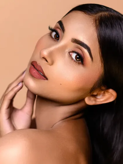 A close-up beauty shot that demonstrates my skill in high-end skin retouching. The result is a clean, radiant look that feels both professional and authentic.