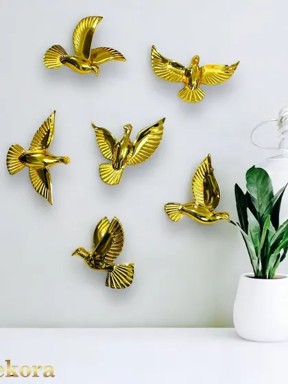 This set of six golden birds can be arranged in a flowing pattern to create a sense of freedom and movement on your wall.